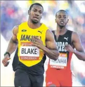  ?? AFP ?? Yohan Blake (left) was expected to come out of the shadow of Usain Bolt but he finished third at the CWG 100m race.