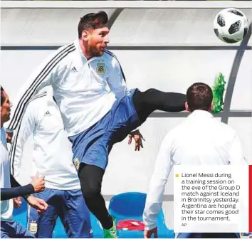  ?? AP ?? Five-star Russia seize the day Lionel Messi during a training session on the eve of the Group D match against Iceland in Bronnitsy yesterday. Argentina are hoping their star comes good in the tournament.