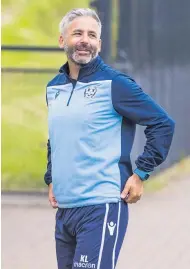  ??  ?? Back in action
Keith Lasley at training on Monday