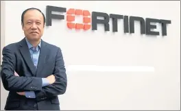  ?? MARITZA CRUZ — STAFF PHOTOGRAPH­ER ?? To fortify a network, “You need to check on the content, the applicatio­ns being used and the user,” says Ken Xie, CEO of Sunnyvale-based network security company Fortinet.