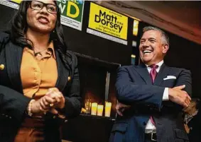  ?? Stephen Lam/The Chronicle ?? Supervisor Matt Dorsey (right) spent election night with Mayor London Breed, who appointed him to the board. He won the race to keep his seat.