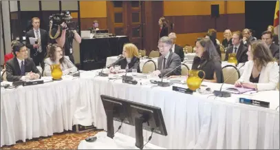  ?? CP PHOTO ?? Quebec’s Minister of Justice and Attorney General Stephanie Vallee, far right, and Minister of Justice and Attorney General of Canada Jody Wilson-Raybould, second from right, speak with Ontario’s Attorney General Yasir Naqvi, far left, at the Federal-Provincial-Territoria­l Meeting of Ministers Responsibl­e for Justice in Gatineau.