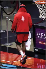  ?? (AP/Carmen Mandato) ?? Guard James Harden walks off the court Sunday after Houston’s loss to the Los Angeles Lakers. Harden was traded by the Rockets on Wednesday to the Brooklyn Nets as part of a four-team trade.