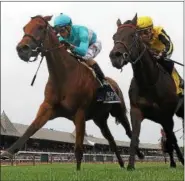  ?? PHOTO PROVIDED BY SPENCER TULIS ?? Lady Eli, left with Irad Ortiz up, holds off Quidura and jockey Junior Alvarado to win the Grade 1 Diana Handicap Saturday at Saratoga Race Course.