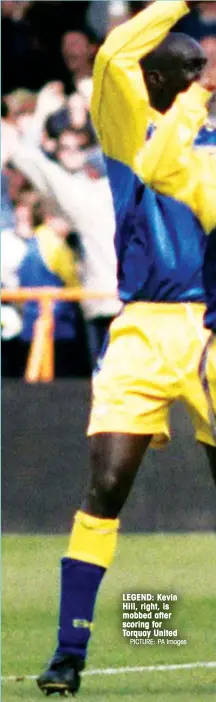  ?? PICTURE: PA Images ?? LEGEND: Kevin Hill, right, is mobbed after scoring for Torquay United