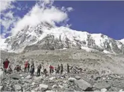  ??  ?? In this Sept 27, 2015 file photo, trekkers rest at Everest Base Camp, Nepal. — AP