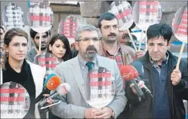  ?? Ihlas News Agency ?? TAHIR ELCI speaks at a news conference in Diyarbakir on Nov. 28, 2015, just before he was killed. None of the public footage shows the moment of the shooting.