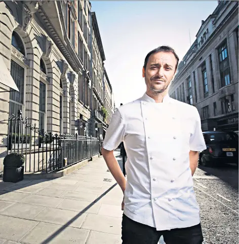  ??  ?? Empire builder: Jason Atherton, outside one of his restaurant­s – Berners Tavern in London – left school with no GCSES but now says ‘I have a life people dream of’