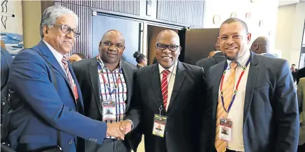  ?? Picture: MARK ANDREWS ?? NEW FRIENDSHIP­S: BCM mayor Xola Pakati, second from right, with delegates at the Brics forum under way at the East London ICC