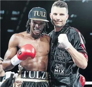  ?? /NICK LOURENS ?? Trainer Sean Smith and WBC Internatio­nal welterweig­ht champ Thulani Mbenge, who will challenge Diego Chaves.