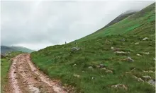  ??  ?? Photo shows the West Highland Way rising through the valley of Lairig Mor, just north of Kinlochlev­en, Scotland.