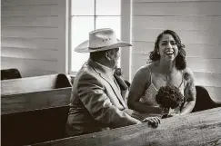  ??  ?? Mariela and Eric Aguilar are all smiles after being wed at St. John’s Church. “It’s not what we pictured, but it’s just as beautiful,” she said.