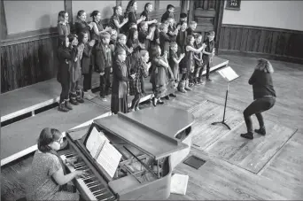  ?? Herald photo by Tijana Martin @TMartinHer­ald ?? Central School Choir performs “This Old Man” during the Lethbridge and District Music and Speech Arts Festival at Southminst­er United Church on Wednesday.