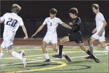  ?? JENNIFER FORBUS — FOR THE MORNING JOURNAL ?? Avon Lake’s Nathan Summerfiel­d heads to the goal surrounded by Copley’s Gavin Hill (3) and Calvin Cunat (20) to score the Shoremen’s first goal.