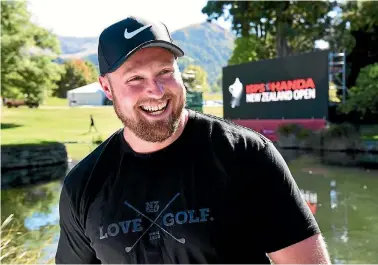  ??  ?? A cheerful Tom Walsh at Arrowtown yesterday, Walsh will play in the pro-am format of the NZ Open, starting this morning.