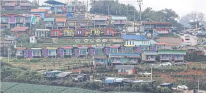  ??  ?? LOCAL COLOUR: Colourful resorts on Phu Thap Boek in Phetchabun’s Lom Kao district will soon be repainted brown to make them blend in with their natural surroundin­gs. They will also be renovated to accommodat­e up to 20 guests at a time and their...