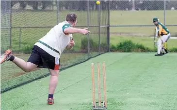  ??  ?? Grant Duncan bowls some of his trademark spin during the first session back as Hallora look to go one better this season in the WDCA.