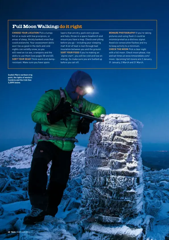  ??  ?? Scafell Pike’s northern trig point, the lights of western Cumbria and the Irish Sea 3,209ft below.