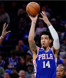  ?? Associated Press ?? Philadelph­ia’s Danny Green tied for the team lead with 21 points, all of them coming from behind the arc. Green made 7 of 9 from 3.