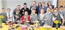  ??  ?? Fundraiser­s Pupils, parents and teachers are active in other ways too, such as at the Great Daffodil Appeal 2018 for Marie Curie