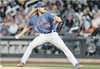  ?? /GETTY IMAGES. ?? Noah Syndergaar­d solo lanzó dos entradas en la temporada 2021 con los Mets, luego de una larga y complicada rehabilita­ción tras una cirugía Tommy Jonh.