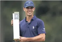  ?? STEVEN PASTON — PA VIA AP ?? American Billy Horschel celebrates after winning the BMW PGA Championsh­ip at Wentworth Golf Club in Surrey, England on Sunday.