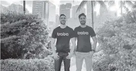  ??  ?? Mike Shebat, left, and Akshay Buddiga are co-founders of Traba, an app to connect workers with open shifts at warehouses, event venues, and distributi­on centers.