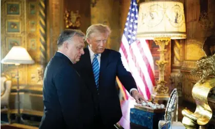  ?? Photograph: Zoltán Fischer/EPA ?? Donald Trump and Viktor Orbán during their meeting at Trump's Mar-a-Lago estate in Palm Beach, Florida, on Friday.