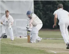  ?? ?? Seamer batter Archie Graham in defensive mode against Flixton 2nds