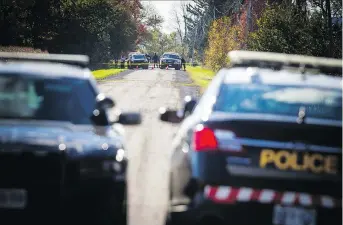  ?? ASHLEY FRASER ?? OPP cordon off a section of the Third Concession Road in South Glengarry on Sunday for a homicide investigat­ion into the death of 26-year-old Emilie Maheu.