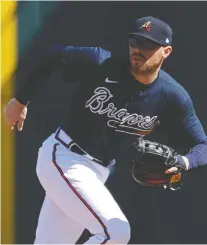  ?? JOE ROBBINS/GETTY IMAGES ?? Atlanta Braves first baseman Freddie Freeman has fought his way back to health after contractin­g the novel coronaviru­s, including a high fever, earlier this month.