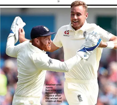  ??  ?? Another one: Jonny Bairstow and Broad (right) rejoice after the wicket of Imam-ul-Haq