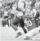  ?? ED ZURGA/AP ?? Chiefs defensive end Emmanuel Ogbah sacks Ravens quarterbac­k Lamar Jackson during a game on Sept. 22, 2019, in Kansas City, Mo.