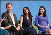  ?? CHRIS JACKSON — WPA POOL/GETTY IMAGES ?? Prince Harry, his then-fiancee Meghan Markle and the Duchess of Cambridge appear at an event in February.