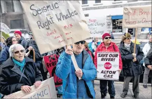  ?? THE CANADIAN PRESS/DARREN CALABRESE ?? A coalition of environmen­tal and fisheries groups protest potential changes to environmen­tal assessment­s for major offshore oil and gas projects in Halifax on Wednesday.
