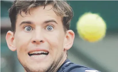  ?? Picture: AFP ?? EYE ON THE PRIZE. Austria’s Dominic Thiem watches the ball as he returns to Germany’s Alexander Zverev during their French Open quarterfin­al at Roland Garros yesterday.