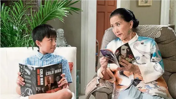  ??  ?? Ian Chen and Lucille Foong who play evan and Grandma Huang respective­ly are scene-stealers in Fresh Off The Boat. — Handout