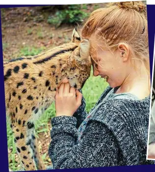  ??  ?? ‘My beautiful, briliant little girl’: Iris makes a furry friend on holiday in