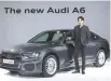  ?? Yonhap ?? Actor Lee Jin-wook poses with the new Audi A6 sedan during the vehicle’s launching event at the Banyan Tree Club &Spa in Jung-gu, Seoul, Wednesday.