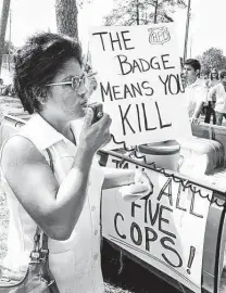  ?? Staff file photo ?? Margarita Torres, mother of Joe Campos Torres, speaks to marchers in Houston before a march on Oct. 8, 1977.