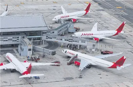  ?? REUTERS ?? An aerial view shows Avianca’s planes parked at El Dorado Internatio­nal Airport in Bogota, Colombia on April 7.