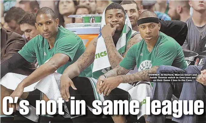  ?? STAFF PHOTO BY MATT STONE ?? DOWNER: Al Horford, Marcus Smart and Isaiah Thomas watch as time runs out on their Game 1 loss to the Cavs.