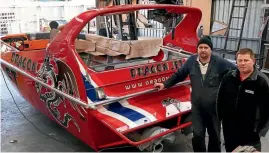  ?? PHOTO: ROBYN EDIE/ FAIRFAX NZ ?? Dwayne Terry, left, and Paul Cross of KeelowCraf­t boat builders in Gore. The commercial­sized twin engine jet boat has been built for Dragon Jet and Terry is shifting to Thailand to run the jet boating business out of Phuket.