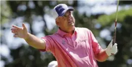  ??  ?? PEABODY: Kenny Perry tries to coax the ball after teeing off on the third hole during the fourth round of the US Senior Open golf tournament, Sunday, in Peabody, Mass. — AP