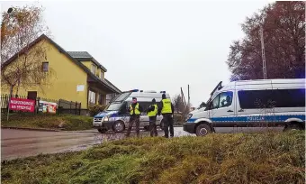  ?? ?? Police officers stand at a blockade after an explosion in Przewodow, a village in eastern Poland near the border with Ukraine, yesterday. — Reuters