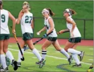  ?? THOMAS NASH - DIGITAL FIRST MEDIA ?? Methacton’s Emily Owens, center, led the Warriors to the PAC championsh­ip this fall.