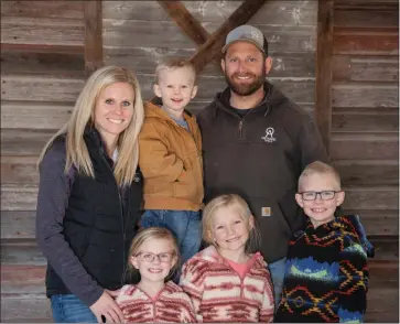  ?? Donnis Hueftle-Bullock ?? Pictured above is the Ostrand family, a ranching family from Ansley. Back row, from left: Danielle, Merrik and Kory. Front: Avery, Olivia and Brexton.