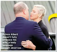  ?? ?? Prince Albert doesn’t fully embrace his wife, a body language expert observes
