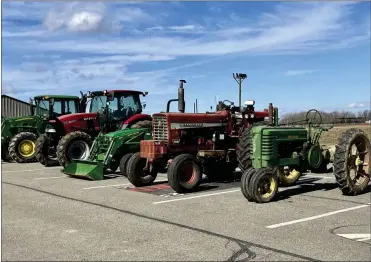  ?? ?? FFA students kicked off FFA Week this week by driving their tractors to school Tuesday
Photo by Emily Schwan