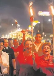  ?? Orlando Sierra AFP/Getty Images ?? PROTESTERS want Honduras’ president to quit after accusation­s that his party used Social Security Institute money to finance its last campaign.